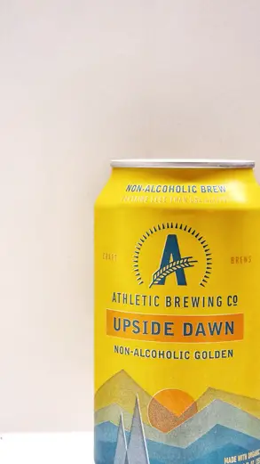 Upside Dawn Golden Ale - Athletic Brewing Co Can face