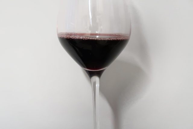 zero alcohol wine in Glass with drop shadow