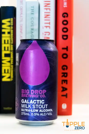 Galactic Milk Stout Review Big Drop Can in front of books