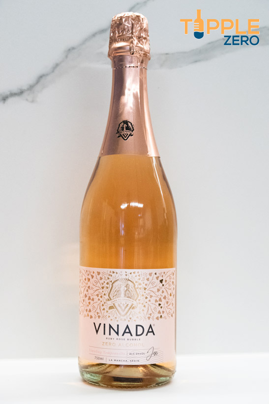 Front of the Vinada Sparkling Rose Bottle on a bench