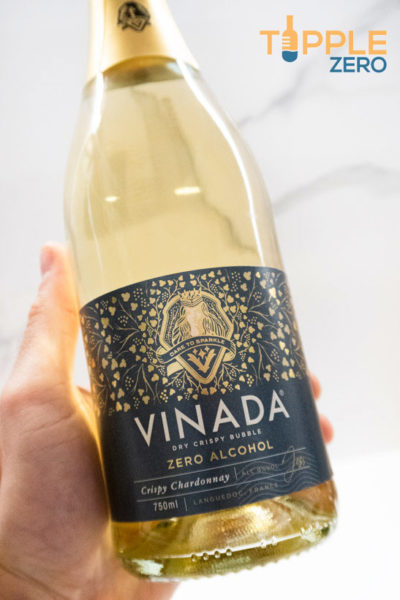 Vinada Sparkling Review bottle in hand