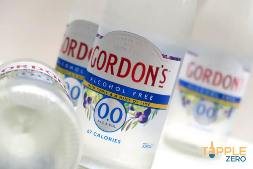 Gordon's 0.0 Gin and Tonic bottles in different positions in the foreground and background