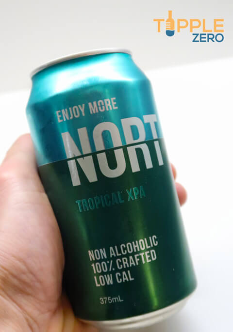Non alcoholic beer can in hand with Tipple Zero Logo