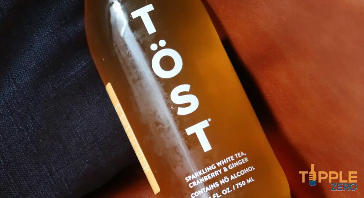 Bottle of Tost on a leather chair