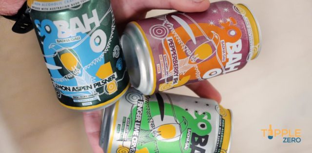 Sobah Beer cans on a together in a hand