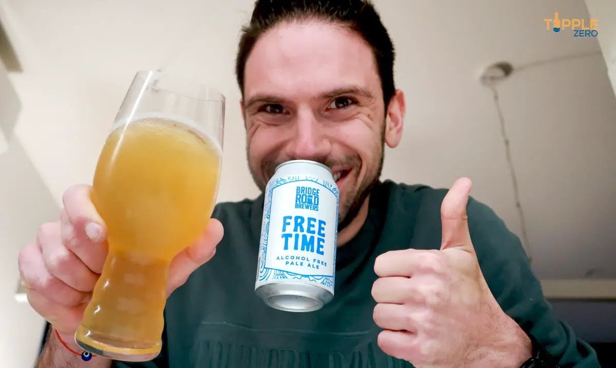 man giving thumbs up with Bridge Road Free Time Pale Ale Can in mouth and glass in other hand
