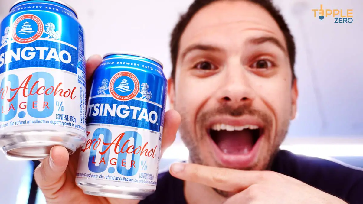 Tsingtao 0.0 Zero Alcohol Lager Cans in hand