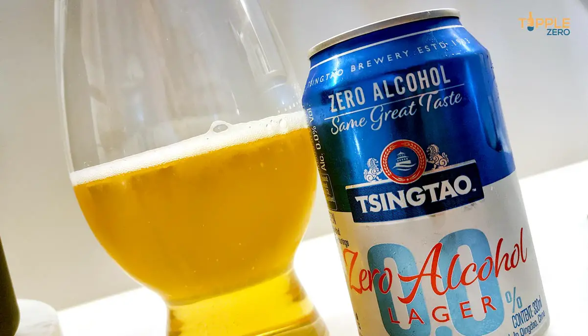 Tsingtao 0.0 poured in glass next to can