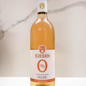 Giesen Zero Non Alcoholic Rose Bottle on bench showing label