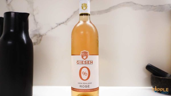 Giesen Zero Non Alcoholic Rose Bottle on bench showing label