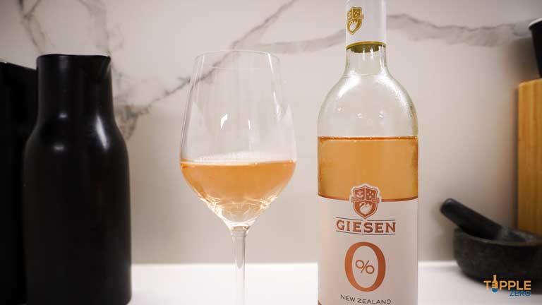 Giesen Zero Rose poured into a glass showing it with a pinkish hue