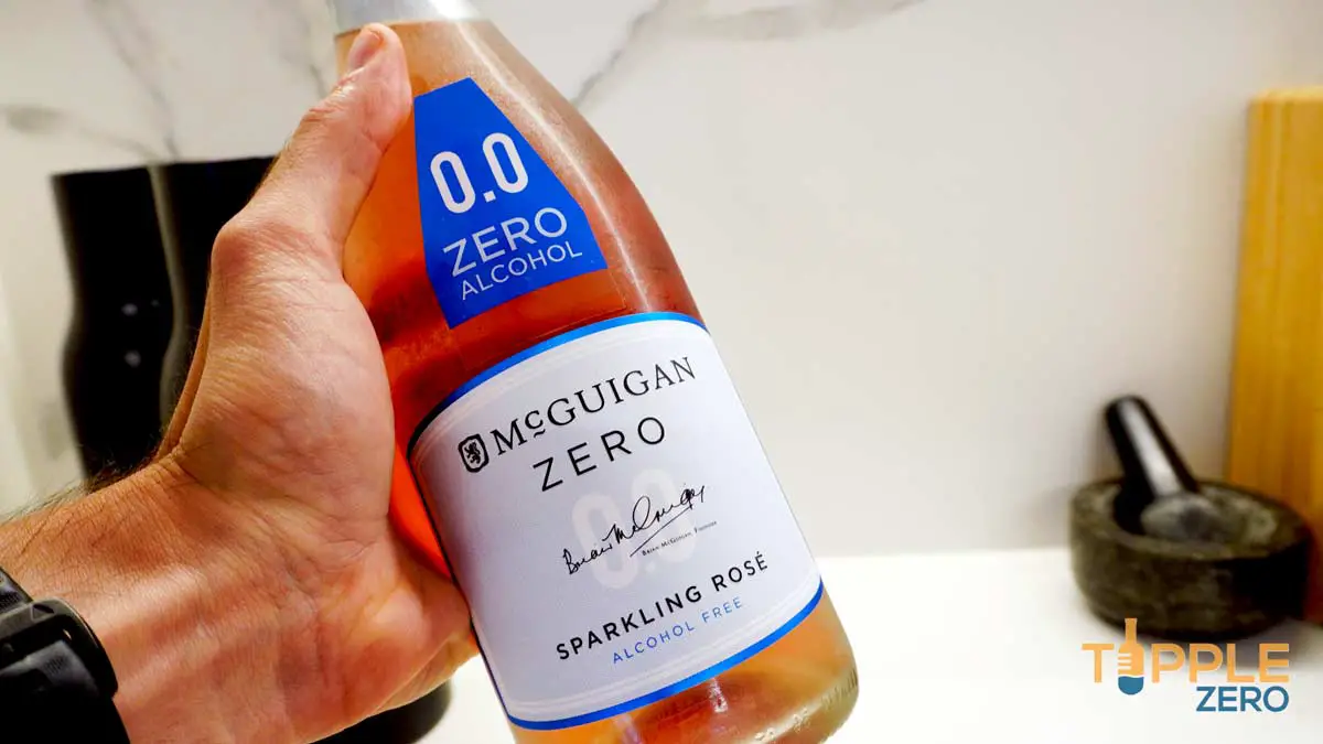 McGuigan Zero Sparkling Rose bottle label in hand